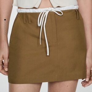 Mango Contrast waist miniskirt in Beige